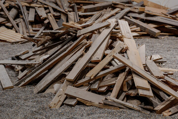 Pile and stack of old removal timber from construction site or building. 