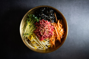 Raw beef mixed with rice