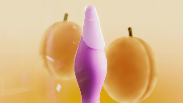 Fun Composition with a lubricated anal plug and peaches in the background. Symbolize intrigue before anal sex as a game concept.