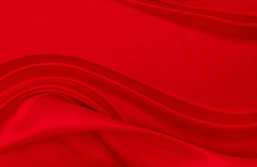 Black red satin dark fabric texture luxurious shiny that is abstract silk cloth background with patterns soft waves blur beautiful.