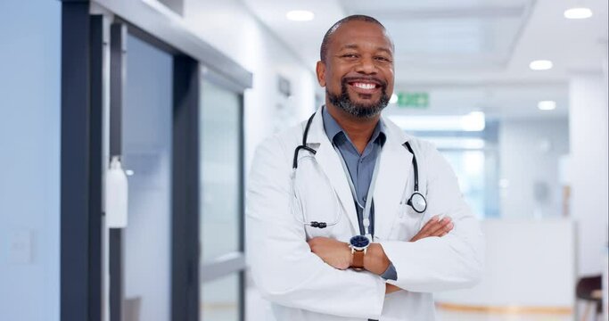 Black man, doctor with arms crossed and portrait, health and cardiovascular surgeon, pride with confidence. Medical professional, senior physician and help, trust and integrity with expert and smile