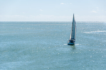 A sailboat sailing in the Atlantic Ocean