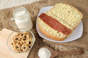 Bread with smoked beef on a plate for breakfast and coffee break