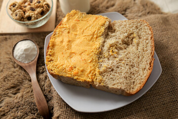 Bread with salted egg spread on a plate for healthy breakfast