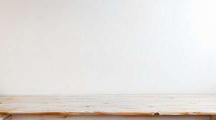 empty wooden table set against a white wall background provides an ideal canvas for product advertisement