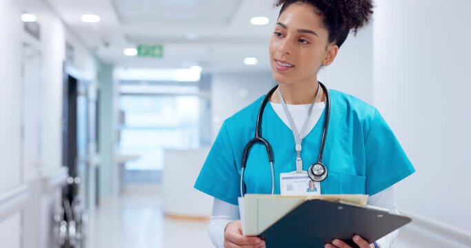 Nurse, woman and documents for hospital charts, medical report or healthcare paperwork and happy management. African surgeon or doctor walking with clipboard, folder and schedule or clinic admin