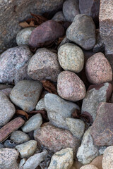 stone wall background,Gravel texture. Stones background. Rocks pattern. Gray noise backdrop. Pebble texture. Pile of rocks.