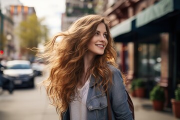 Fototapeta premium Young woman walking street smile face