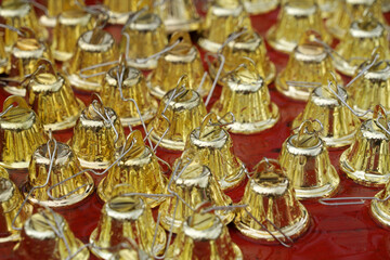 Closeup view of many beautiful old fashioned golden bells