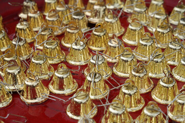 Closeup view of many beautiful old fashioned golden bells