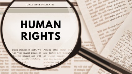 Selective Focus Photography of Human Rights Text Publication in Newspaper