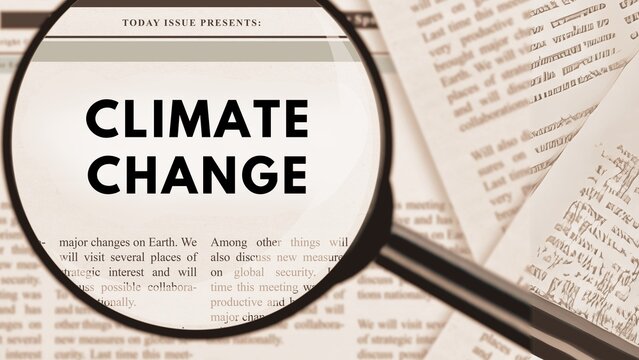 Selective Focus Photography of Climate Change Text Publication in Newspaper