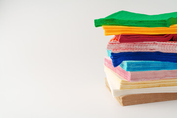 Stack of paper napkins on white background