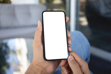 Male hands holding phone with screen isolated in office