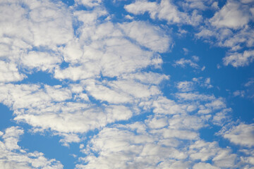 beautiful beautiful white clouds against the blue endless sky on a summer day. wallpaper. background for designers. desktop screensaver. postcard. calendar