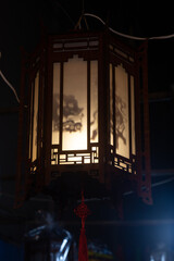 Closeup of Chinese traditional paper lanterns in the dark