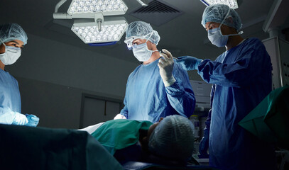Teamwork, tools or doctors in surgery emergency procedure or healthcare operation in hospital at...