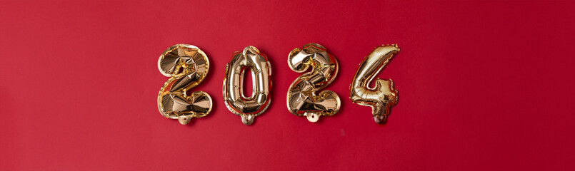 Gilded Beginnings: Embracing 2024 with Golden Foil Numbers on Red
