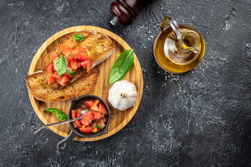 toast with tomatoes, garlic and herbs. Healthy breakfast concept. superfood concept. Healthy, clean...