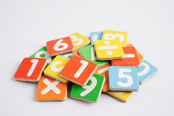 Number wood block cubes for learning Mathematic, education math concept.