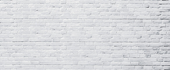 Brick wall and wooden floor, antique old grunge white grey texture wide panorama background.