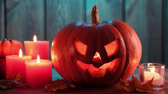 halloween pumpkin head jack lantern on wooden background. dramatic lighting