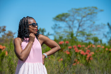 Portrait of woman seen standing in nature