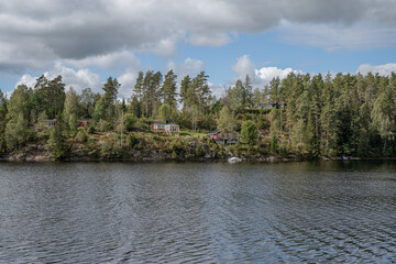 Lake Ragnerudssjoen in Dalsland Sweden beautiful nature forest pinetree swedish houses