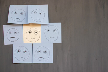 happy among sad emoticon