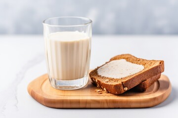 toast with melted almond butter and a glass of milk