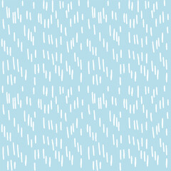 Abstract seamless pattern of vertical short white stripes on a blue background