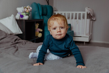 Fototapeta premium Portrait of a cute blond baby boy