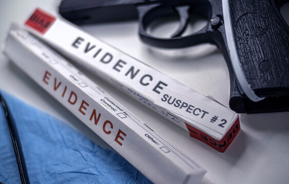 Sealed gun in crime lab next to DNA evidence, crime investigation, crime investigation, conceptual image