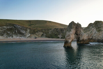 Most Beautiful High Angle Footage of British Landscape and Sea View of Durdle Door Beach of England...