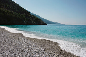 Oludeniz beach in Fethiye - clear turquoise water and empty beach - swimming