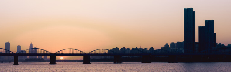 web banner sunset with silhouette city and bridge background at seoul korea