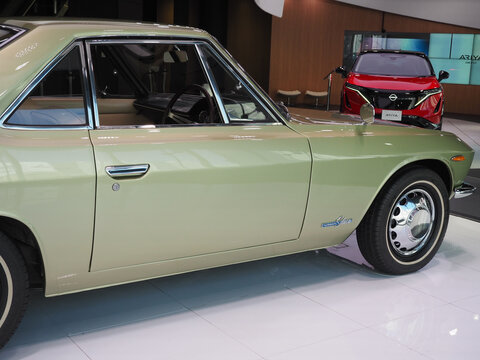 TOKYO, JAPAN - October 13, 2023: A Nissan Silvia (CSP311) on display at Nissan Crossing showroom in Ginza. There is a Nissan Ariya in the background.