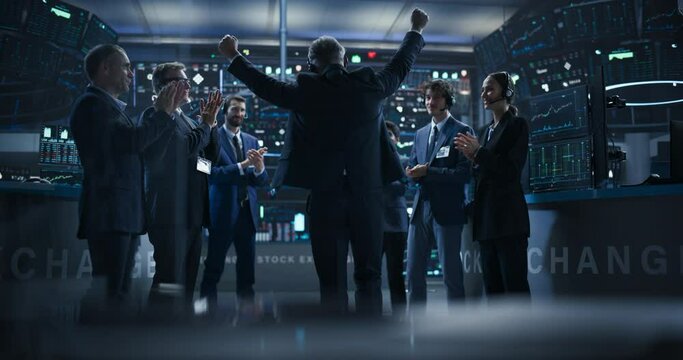 Team of Successful Stock Exchange Brokers Celebrating a Profitable Investment Bid on a Securities Market. Diverse Specialists and Asset Managers Clapping, Cheering, Shaking Hands with the Team Leader