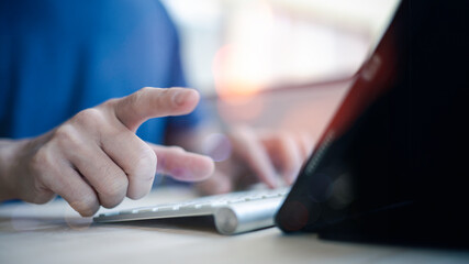 Social media marketing concept. hand using smarttablet typing, chatting conversation in chat box icons pop up, Analyst working with Business, Analytics and Data Management System