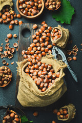 Hazelnuts in a fabric bag. Unpeeled hazelnuts in the shell. Organic healthy nuts. Close up.