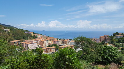 Obraz premium a view of a town on the side of a hill