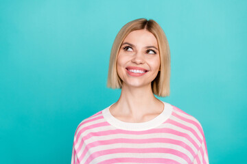 Fototapeta premium Photo of dreamy thoughtful lady wear pink pullover looking empty space isolated turquoise color background
