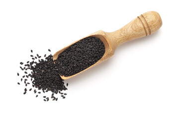Organic Black Sesame (Sesamum indicum) Seeds in a wooden scoop, isolated on a white background. Top view.