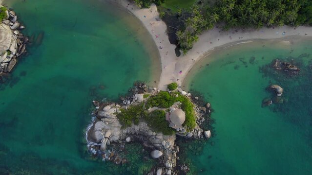 Cabo de San Juan tropical beach and turquoise water at sunset time. Drone ascent