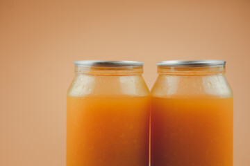 Fresh orange juice in plastic bottle cup. Concept of beverage for good healthy
