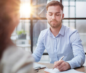 business man sitting at his desk in the office