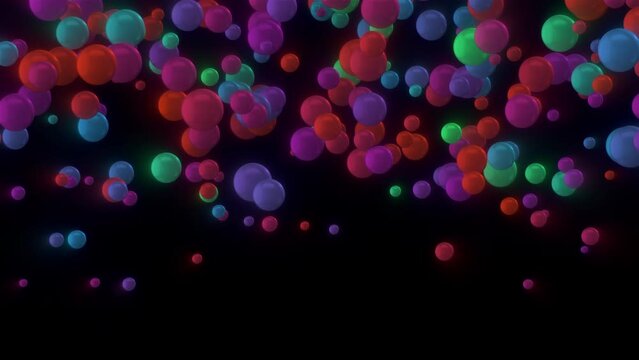falling colored balls on black background