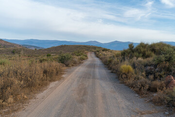 dirt road crossing the mountain,