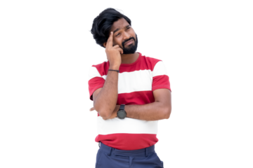 a man with a beard and a red and white shirt is talking on a cell phone and is leaning against his head
