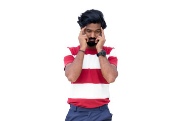 a man holding a cell phone to his face while standing in front of a white background with a red and white striped shirt